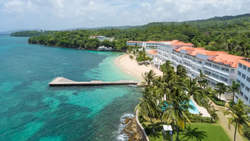 aerial view of white sand beach at couples tower isle resort in ocho rios, jamaica