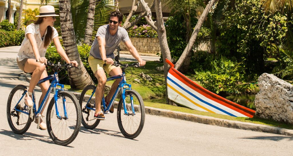 couple riding on bicycle