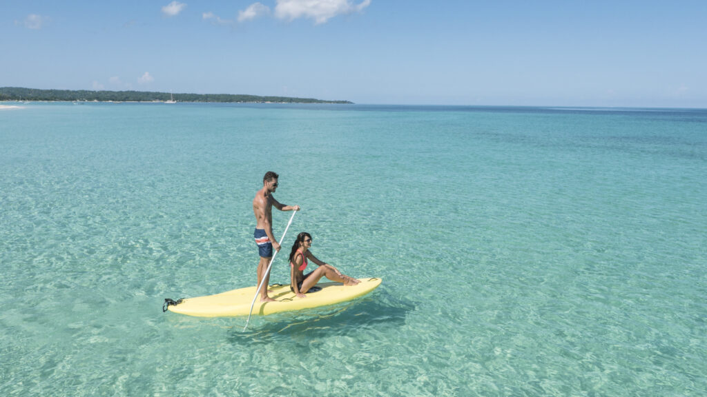 couple paddle boarding