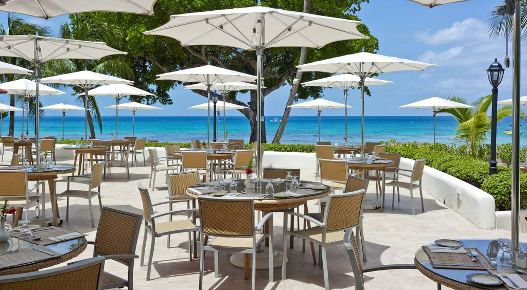 lovely outdoor dining overlooking turquoise ocean