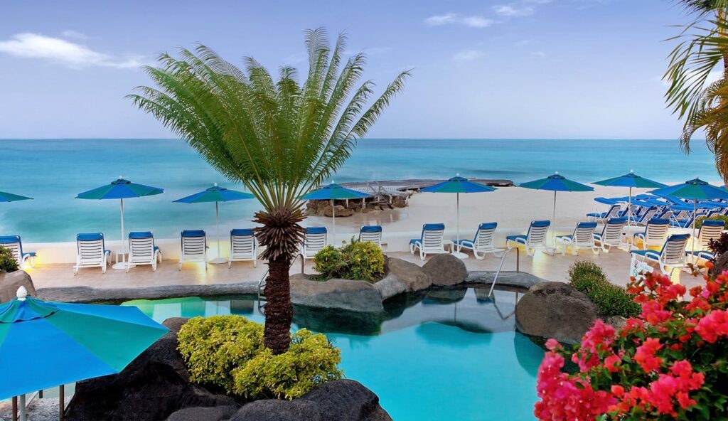 pool overlooking beautiful beach