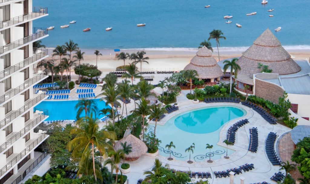 aerial view of pool and beach at Dreams  Acapulco Resort & Spa