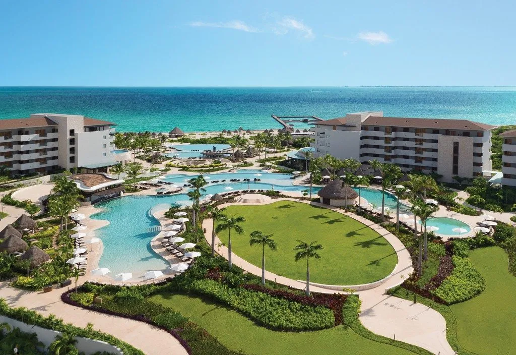 large pools at beach front resort at Dreams Playa Maya