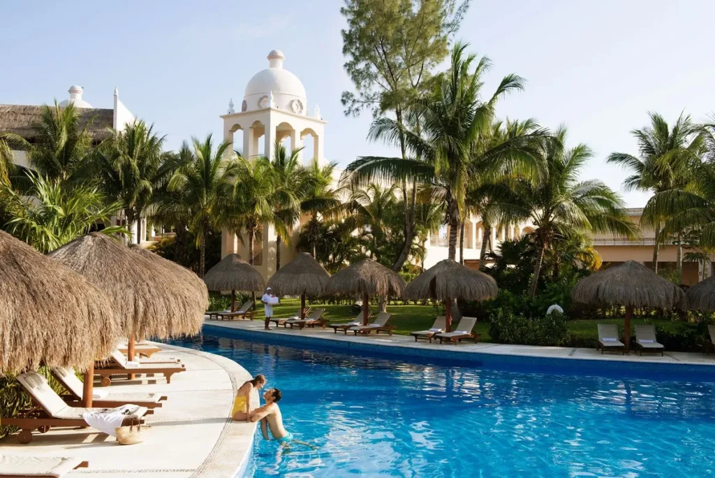 couple lounging in pool