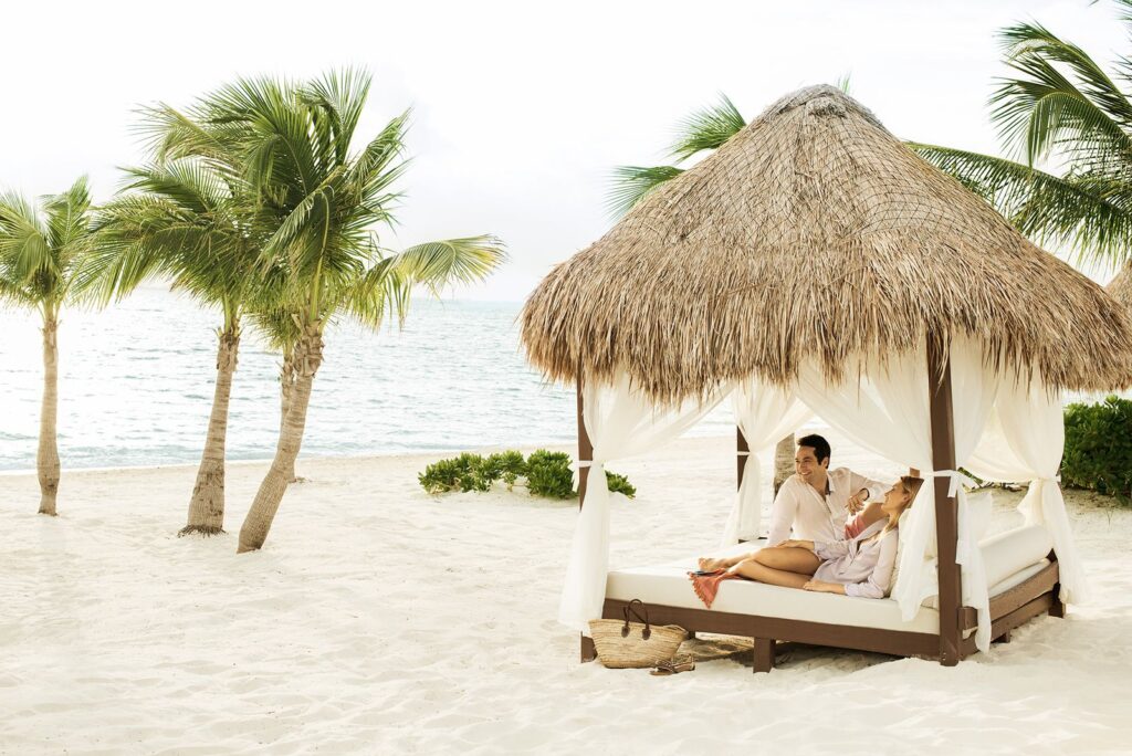 couple on sun lounger