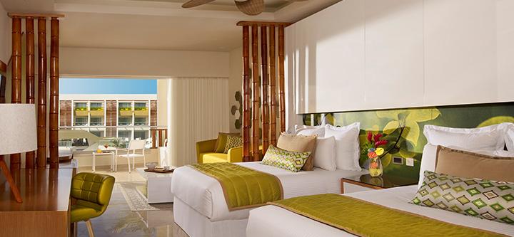 spacious resort room with double beds