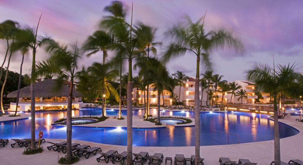 pool surrounded by palm trees