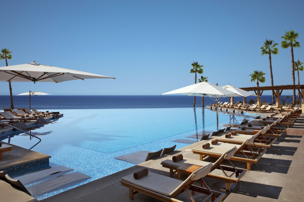 infinity pool next to ocean