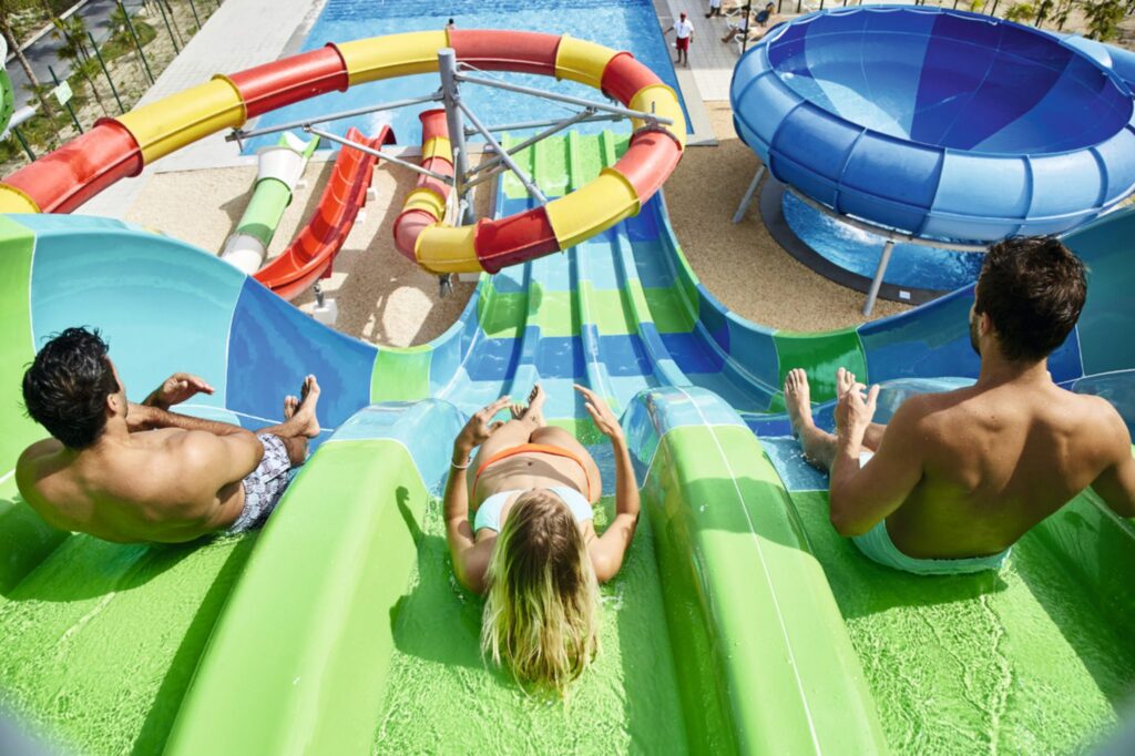 three people going down at waterslide at Hotel RIU Dunamar