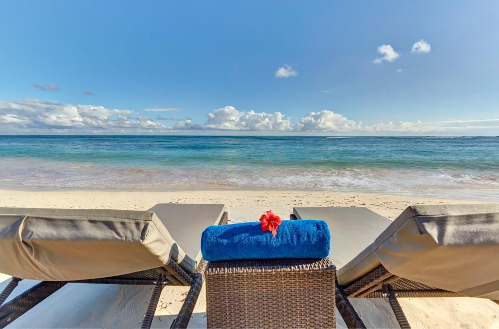 two lounge chairs on Antigua beach
