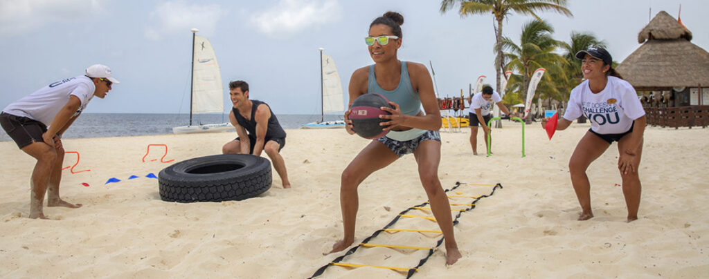 guests exercising on beach