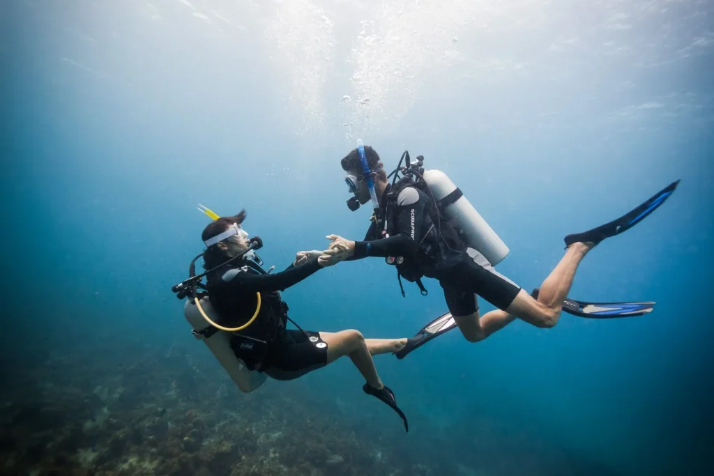 couple scuba diving