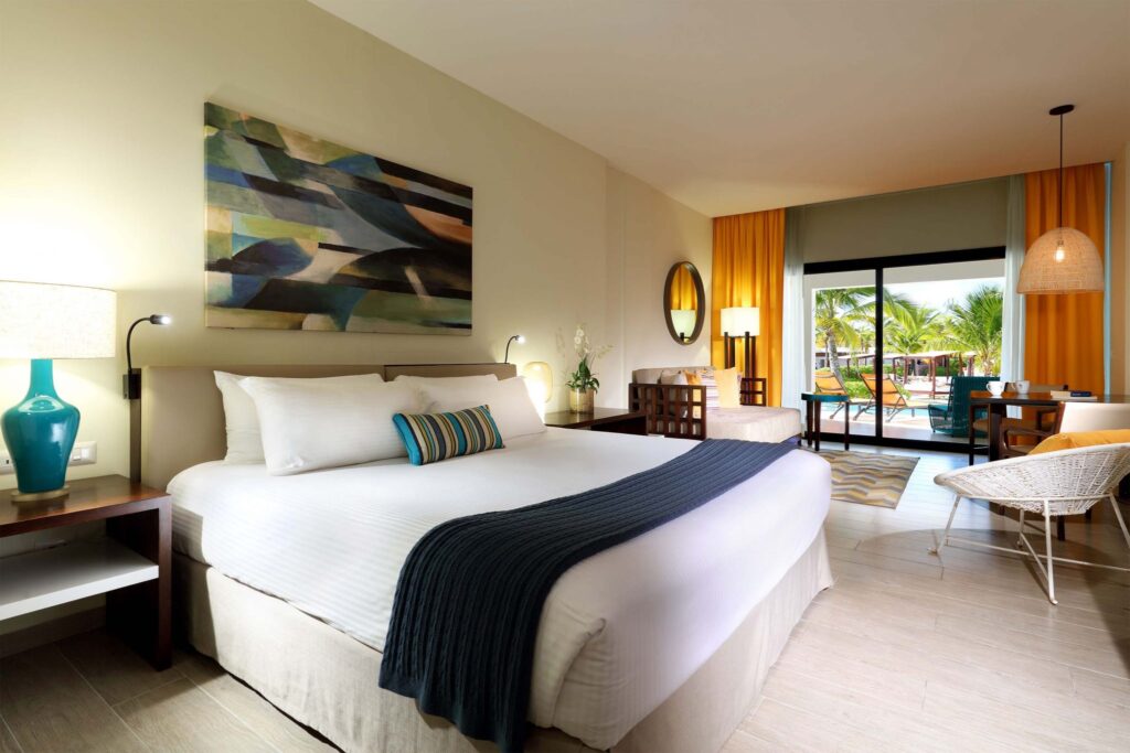 spacious suite with king bed at TRS Cap Cana
