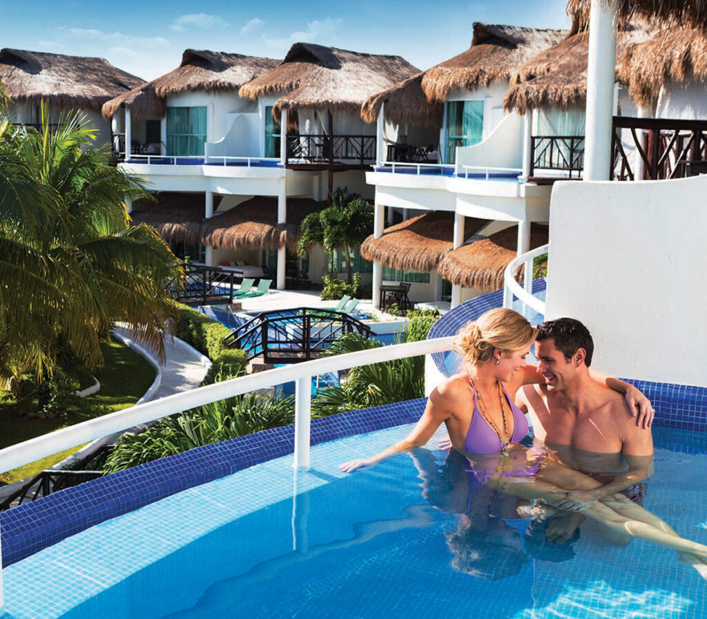 couple lounging in private balcony pool