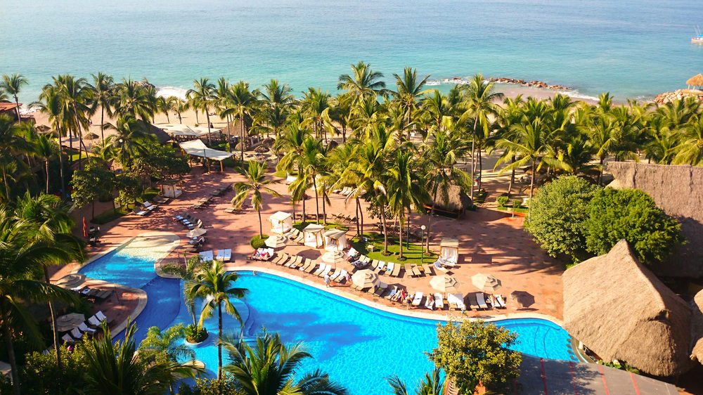 pool and pristine beach at fiesta Americana resort