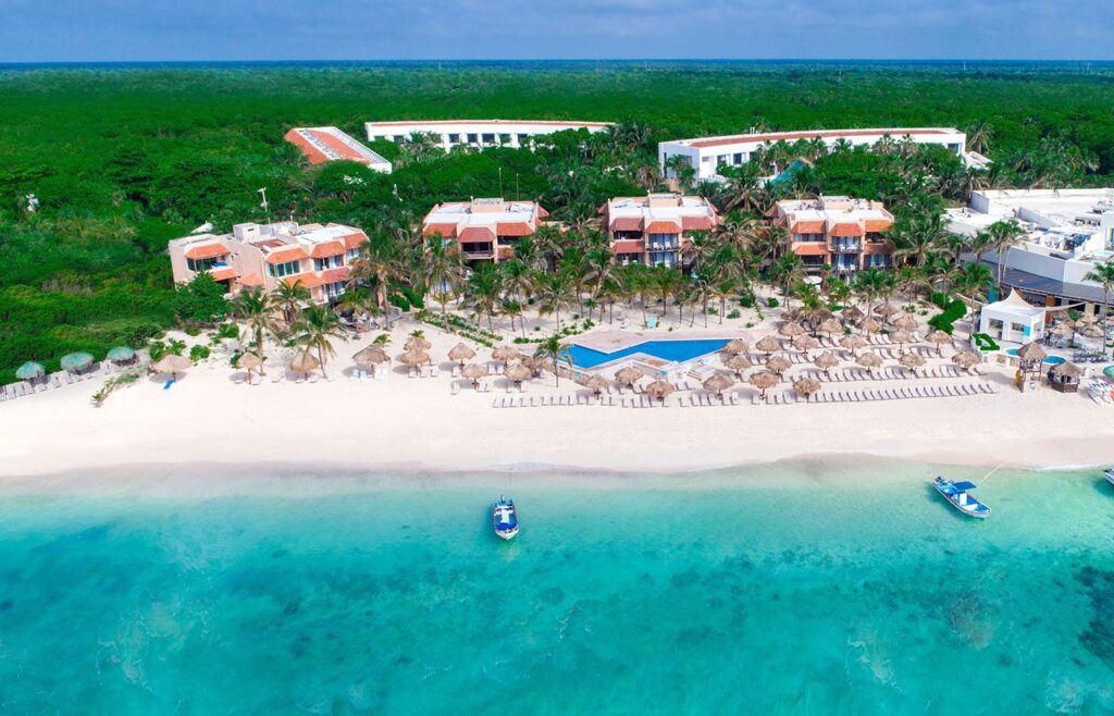 white sand and turquoise water at beach in cancun