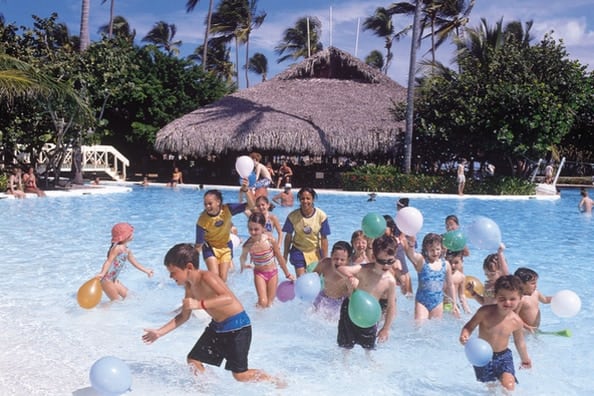 children playing in resort pool