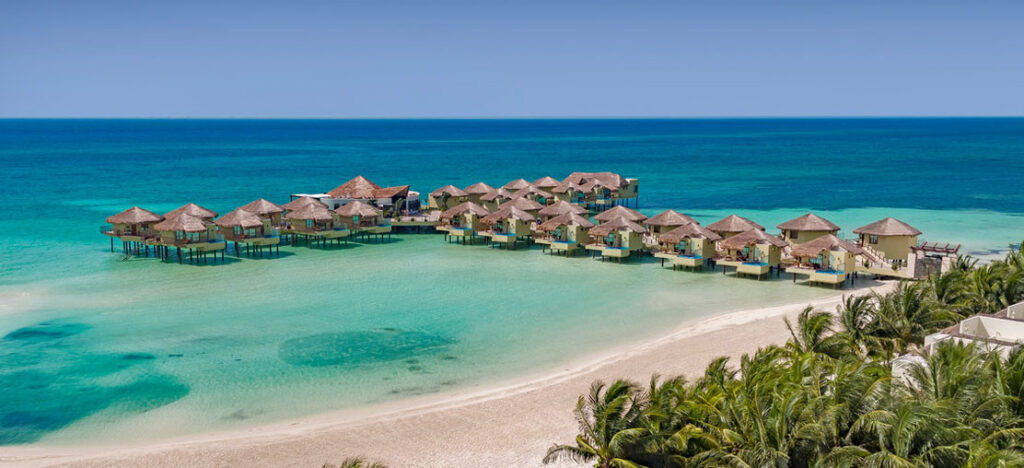 overwater bungalows at El Dorado Maroma Palafitos