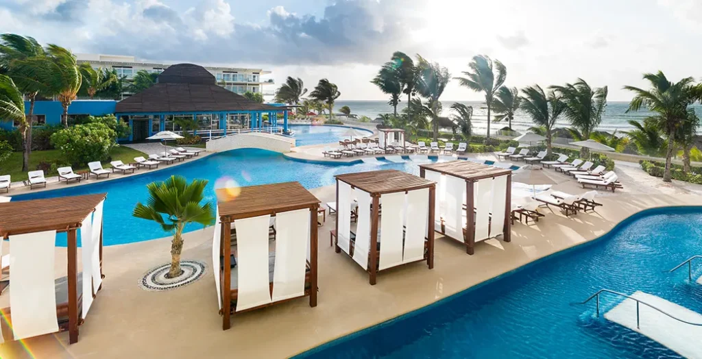 lounge chairs around pool