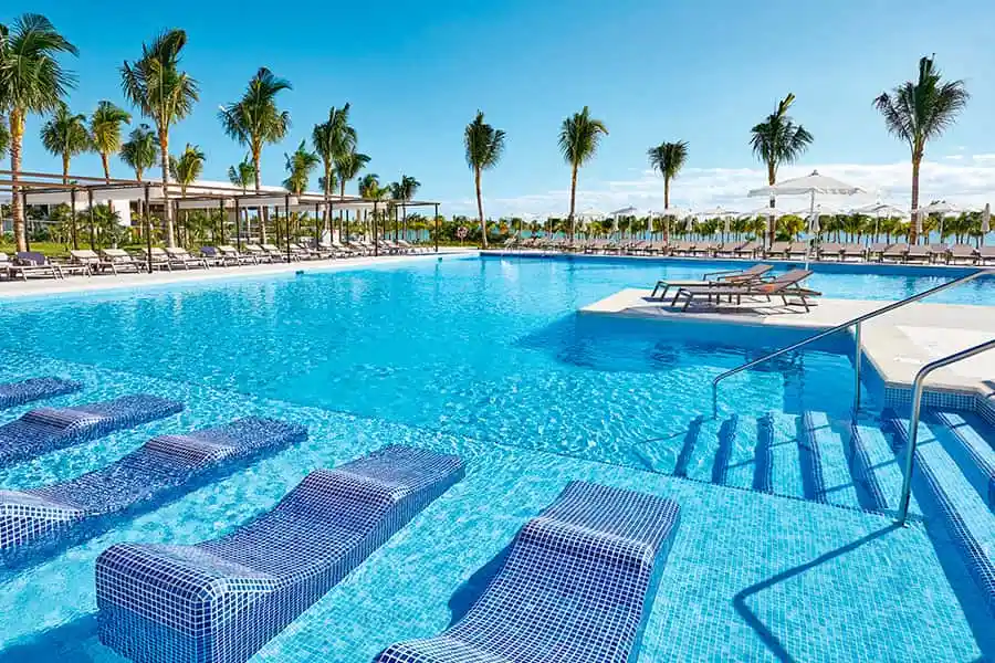 pool with sun loungers