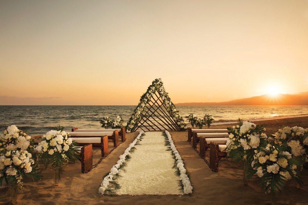 sunset beach wedding at Reflect Krystal Grand Nuevo Vallarta