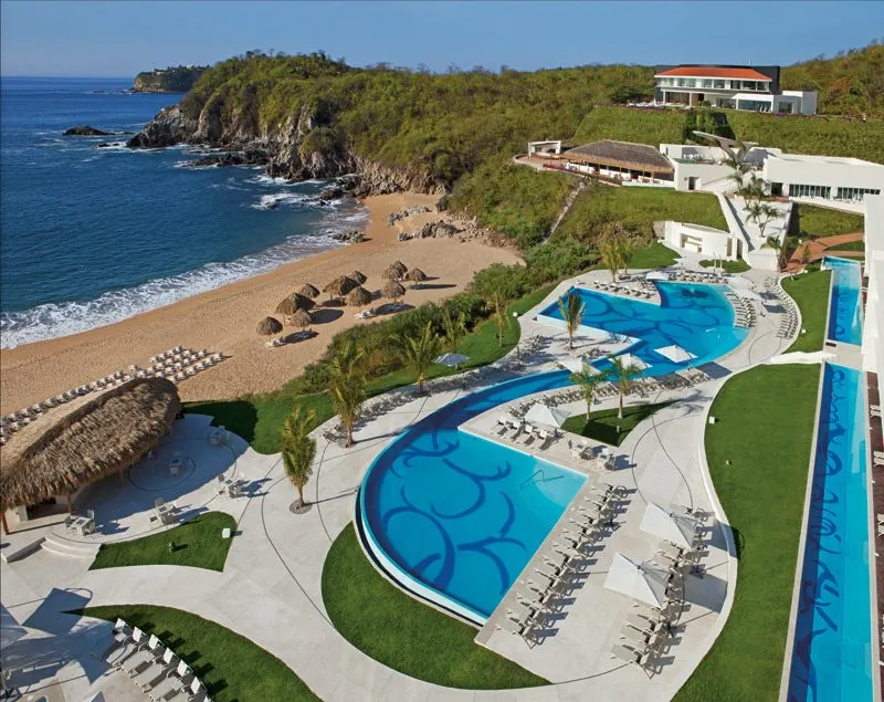 pool and beach at Secrets Huatulco Resort & Spa