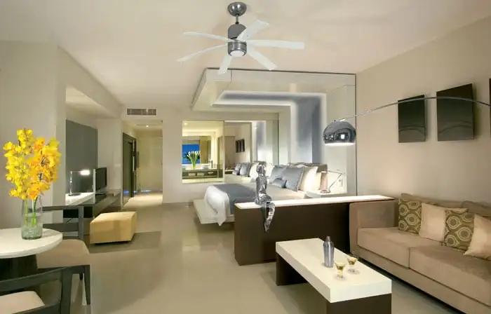 modern suite with sitting area at Secrets Silversands