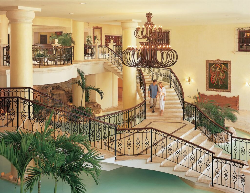 couple walking down stairwell