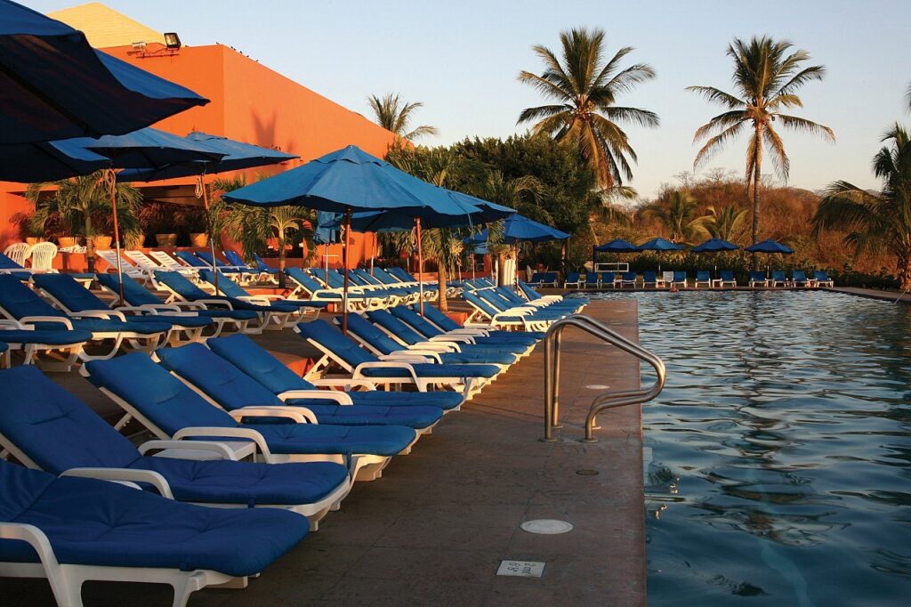 loungers around pool